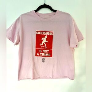 Travis Scott x Cactus Jack “Skateboarding Is Not a Crime” Pink Graphic Tee